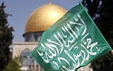 Illustrative: A Hamas flag at the Temple Mount, in 2013 (photo credit: Sliman Khader/Flash90)