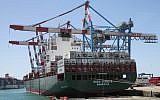 Cranes unload a cargo ship at the Ashdod port in July, 2013 (Isaac Harari/FLASH90)