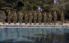 IDF soldiers standing at attention during a memorial ceremony in Israel. (photo credit: Flash90/Yonatan Sindel)