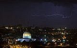 Lightning flashes over Jerusalem Wednesday night as a line of thunderstorms battered Israel (photo credit: Yonatan Sindel/Flash90)