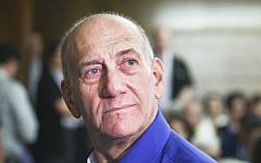 Former prime minister Ehud Olmert at his sentencing at the Tel Aviv District Court, Tuesday, May 13, 2014 (photo credit: Ami Shooman/Flash90)