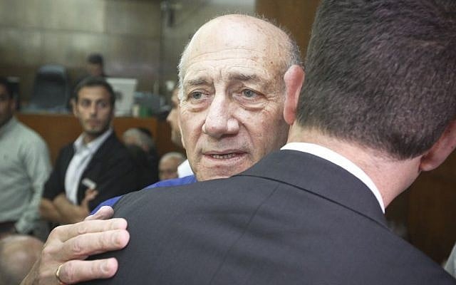 Former prime minister Ehud Olmert at his sentencing at the Tel Aviv District Court, Tuesday, May 13, 2014 (photo credit: Ami Shooman/Flash90)