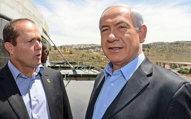 Prime Minister Benjamin Netanyahu (right), and Jerusalem Mayor Nir Barkat tour a sports arena under construction in Jerusalem, on Thursday, May 15, 2014. (photo credit: Haim Zach/GPO/Flash 90) Prime Minister Benjamin Netanyahu (right), and Jerusalem Mayor Nir Barkat tour a sports arena under construction in Jerusalem, on Thursday, May 15, 2014. (photo credit: Haim Zach/GPO/Flash 90)