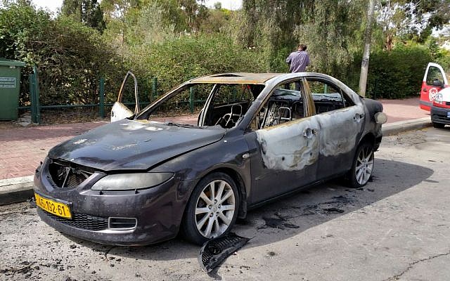 The torched car of Naser Abu Taha. (photo credit: Flash90)