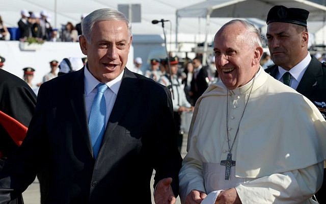 Prime Minister Benjamin Netanyahu walks with Pope Francis on the red carpet at a welcoming ceremony, as the pope lands at Ben Gurion international airport, near Tel Aviv, Israel. Pope Francis arrived in Israel, May 25, 2014, for his first official visit in the region. (Photo credit: Avi Ohayon/GPO/Flash90) Prime Minister Benjamin Netanyahu walks with Pope Francis on the red carpet at a welcoming ceremony, as the pope lands at Ben Gurion international airport, near Tel Aviv, Israel. Pope Francis arrived in Israel, May 25, 2014, for his first official visit in the region. (Photo credit: Avi Ohayon/GPO/Flash90)