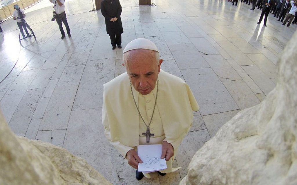 Pope Francis seen praying in front of the Western Wall, the holiest site where Jews can pray, in Jerusalem's Old City, on May 26, 2014. (photo credit: Kobi Gideon/GPO/Flash90) Pope Francis seen praying in front of the Western Wall, the holiest site where Jews can pray, in Jerusalem's Old City, on May 26, 2014. (photo credit: Kobi Gideon/GPO/Flash90)