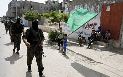 Hamas members take part in a military show in Rafah in the southern Gaza Strip, on May 29, 2014 (photo credit: Abed Rahim Khatib/Flash90)