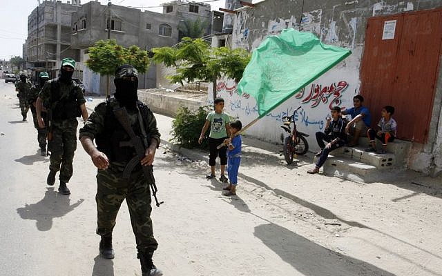 Hamas members take part in a military show in Rafah in the southern Gaza Strip, on May 29, 2014 (photo credit: Abed Rahim Khatib/Flash90) Hamas members take part in a military show in Rafah in the southern Gaza Strip, on May 29, 2014 (photo credit: Abed Rahim Khatib/Flash90)