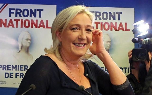 Far right party National Front leader Marine Le Pen poses for photographers before addressing reporters at the party's headquarters in Nanterre, west of Paris, Sunday May 25, 2014.(Photo credit: AP/Remy de la Mauviniere) Far right party National Front leader Marine Le Pen poses for photographers before addressing reporters at the party's headquarters in Nanterre, west of Paris, Sunday May 25, 2014.(Photo credit: AP/Remy de la Mauviniere)