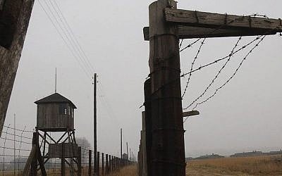 In this Nov. 9, 2005 file picture watch towers and a barbed wire fence of the former Nazi death camp Majdanek outside the city of Lublin in eastern Poland are photographed.  (Photo credit: AP/ Czarek Sokolowski,file)