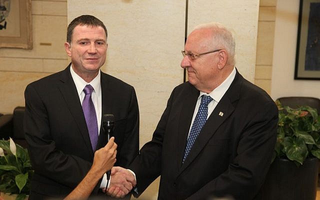 Knesset Speak MK Yuli Edelstein (L) accepts the candidacy for president of Israel from Likud MK Reuven Rivlin (R), May 27, 2013. (photo credit: Knesset Spokesperson) Knesset Speak MK Yuli Edelstein (L) accepts the candidacy for president of Israel from Likud MK Reuven Rivlin (R), May 27, 2013. (photo credit: Knesset Spokesperson)