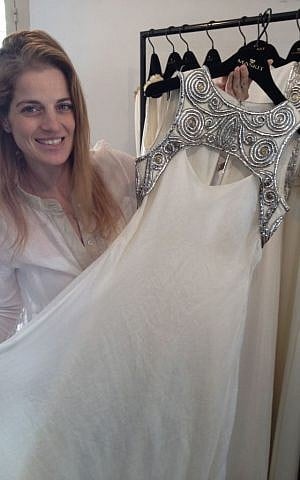 Tal's flagship bridal dress for the first Maskit collection (photo credit: Jessica Steinberg/Times of Israel) Tal's flagship bridal dress for the first Maskit collection, also currently featured in the Israel Museum's Dress Codes exhibit (photo credit: Jessica Steinberg/Times of Israel)