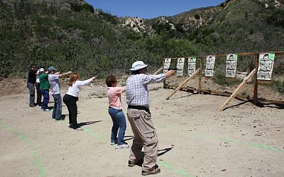 3-G Holocaust survivor children at target practice (Anthony Weiss/JTA)