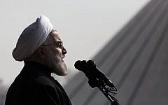 In this Tuesday, February 11, 2014 file photo, Iranian President Hassan Rouhani, delivers a speech during an annual rally commemorating anniversary of the 1979 Islamic revolution, at the Azadi 'Freedom' Square in Tehran, Iran.  (photo credit: AP/Vahid Salemi, File)