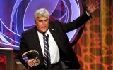 Hall of Fame inductee Jay Leno speaks on stage at the Beverly Wilshire in Beverly Hills, California, on March 11, 2014 (photo credit: AP/Frank Micelotta/Invision for the Television Academy)
