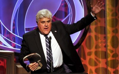 Hall of Fame inductee Jay Leno speaks on stage at the Beverly Wilshire in Beverly Hills, California, on March 11, 2014 (photo credit: AP/Frank Micelotta/Invision for the Television Academy)
