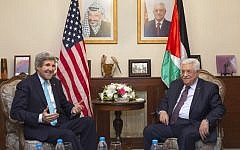 US Secretary of State John Kerry, left, meets with Palestinian Authority President Mahmoud Abbas at the Palestinian Ambassador’s Residence in Amman, Jordan, on March 26, 2014. (photo credit: AP/Jacquelyn Martin/Pool/File)