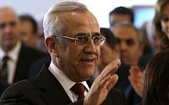 Lebanese President Michel Suleiman waves as he arrives to give his farewell speech at the end of his six-year term, at the presidential palace, in the Beirut suburb of Baabda, Lebanon, Saturday, May 24, 2014. (AP Photo/Hussein Malla)