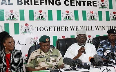 Nigerian officials attend a press conference on the abducted school girls in Abuja, Nigeria, Monday, May 12, 2014 (photo credit: AP/Sunday Alamba)