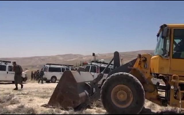 A bulldozer in Ma'ale Rehavam Wednesday.  (Screen capture: Israel National News)