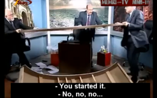 The brawling Jordanian commentators (MEMRI screenshot)