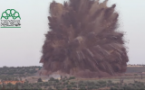 Islamic Front detonates a tunnel bomb beneath a Syrian army base on Wednesday, May 14, 2014 (screen capture: YouTube)