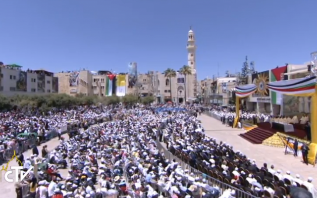 Worshippers and dignitaries gather in Manger Square in Bethlehem for Sunday mass (screen capture: CTV)