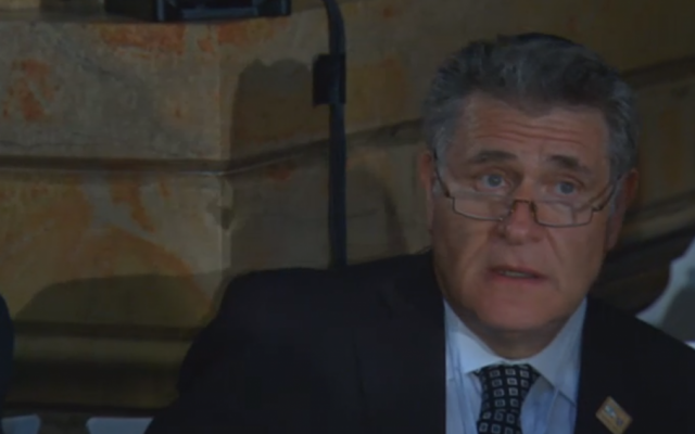 Rabbi Avraham Skorka at the Church of the Holy Sepulchre (screen capture: GPO)