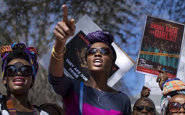 South Africans protest in solidarity against the abduction three weeks ago of hundreds of schoolgirls in Nigeria by the Muslim extremist group Boko Haram and what protesters said was the failure of the Nigerian government and international community to rescue them, during a march to the Nigerian Consulate in Johannesburg, South Africa, on Thursday, May 8, 2014. (photo credit: AP Photo/Ben Curtis) South Africans protest in solidarity against the abduction three weeks ago of hundreds of schoolgirls in Nigeria by the Muslim extremist group Boko Haram and what protesters said was the failure of the Nigerian government and international community to rescue them, during a march to the Nigerian Consulate in Johannesburg, South Africa, on Thursday, May 8, 2014. (photo credit: AP Photo/Ben Curtis)