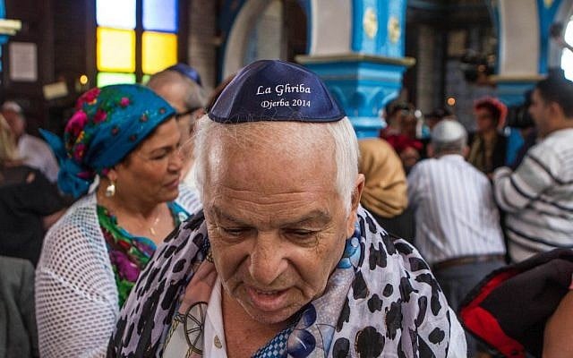 A French Jew, Bebert Zouili, attends the annual pilgrimage in Djerba, Tunisia, in the Ghriba synagogue, the oldest Jewish monument built in Africa more than 2,500 years ago, Friday April 26, 2013. (AP Photo/Aimen Zine) A French Jew, Bebert Zouili, attends the annual pilgrimage in Djerba, Tunisia, in the Ghriba synagogue, the oldest Jewish monument built in Africa more than 2,500 years ago, Friday April 26, 2013. (AP Photo/Aimen Zine)