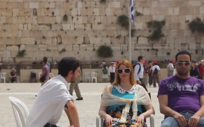 Shalom Shore and two of his street meditation participants at the Western Wall (photo credit: Courtesy Shalom Shore)