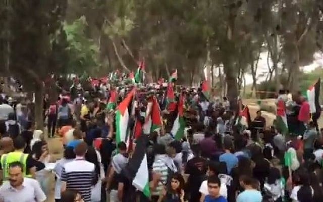 The "March of Return" held near Tiberius at the ruins of Lubya, now Lavie Forest, May 5 2014 (Photo credit: Youtube screen capture) The "March of Return" held near Tiberius at the ruins of Lubya, now Lavie Forest, May 5 2014 (Photo credit: Youtube screen capture)