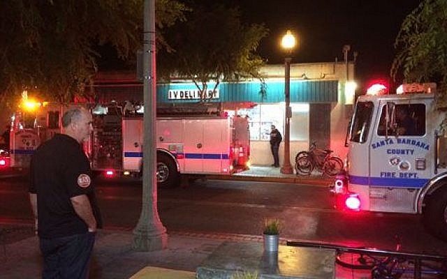 Fire trucks are parked outside the IV Deli Mart on Pardell Road in Isla Vista, Calif., Friday, May 23, 2014, after a drive-by shooter went on a rampage near a Santa Barbara university campus that left seven people dead, including the attacker, and seven others wounded (photo credit: APThe Daily Nexus, Daniel Slovinsky) Fire trucks are parked outside the IV Deli Mart on Pardell Road in Isla Vista, Calif., Friday, May 23, 2014, after a drive-by shooter went on a rampage near a Santa Barbara university campus that left seven people dead, including the attacker, and seven others wounded (photo credit: APThe Daily Nexus, Daniel Slovinsky)
