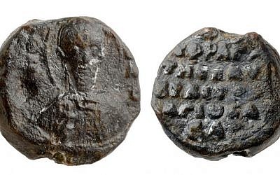 Image of two sides of the Crusader-era seal of St. Sabas monastery discovered in Jerusalem's Bayit Vegan neighborhood. (photo credit: Clara Amit/Israel Antiquities Authority)