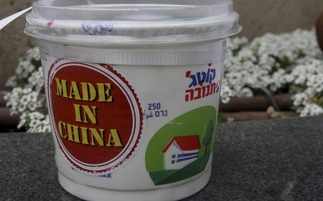 A prop from a February 24, 2014, protest against the sale of the Israeli dairy company Tnuva to a Chinese firm (photo credit: Roni Schutzer/Flash90) A prop from a February 24, 2014, protest against the sale of the Israeli dairy company Tnuva to a Chinese firm (photo credit: Roni Schutzer/Flash90)