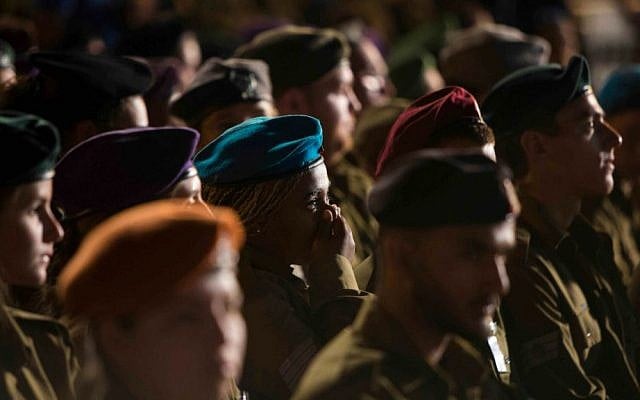 An Israeli soldier seen crying during a Memorial Day ceremony for Israel's fallen soldiers at the Western Wall, May 4, 2014. (Yonatan Sindel/Flash 90) An Israeli soldier seen crying during a Memorial Day ceremony for Israel's fallen soldiers at the Western Wall, May 4, 2014. (Yonatan Sindel/Flash 90)