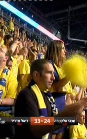 Maccabi Electra Tel Aviv fans in the stands at the Euroleague Final in Milan on May 18. (screen capture: Channel 10)