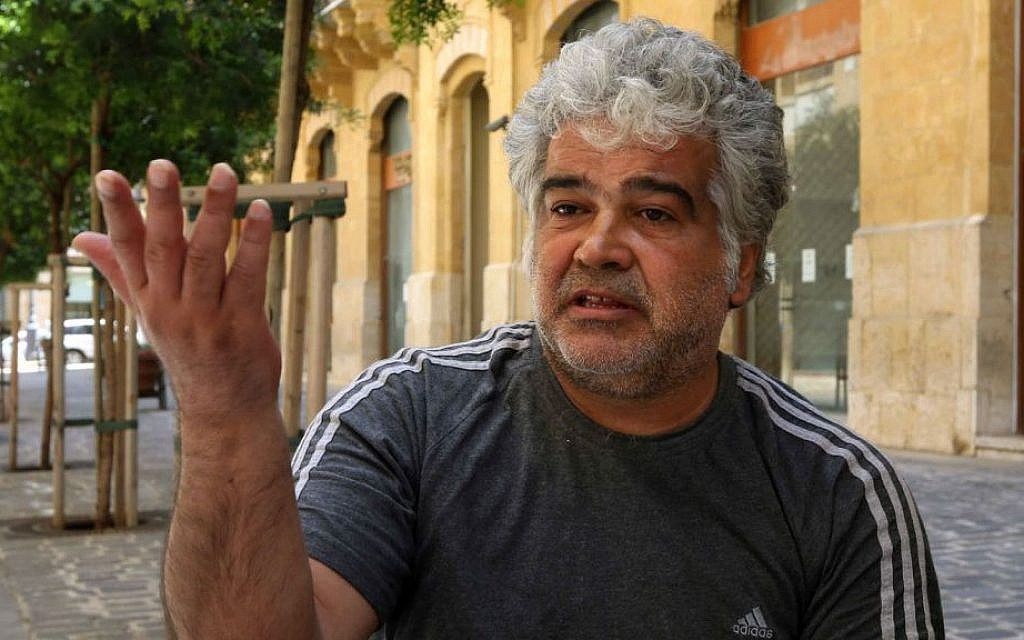 Syrian novelist Khaled Khalifa, speaks during an interview with The Associated Press at a cafe in downtown Beirut, Lebanon. (photo credit: AP Photo/Bilal Hussein) Syrian novelist Khaled Khalifa, speaks during an interview with The Associated Press at a cafe in downtown Beirut, Lebanon. (photo credit: AP Photo/Bilal Hussein)
