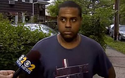 Self proclaimed National Socialist Gabriel Diaz speaks to the press. (screen capture: YouTube)