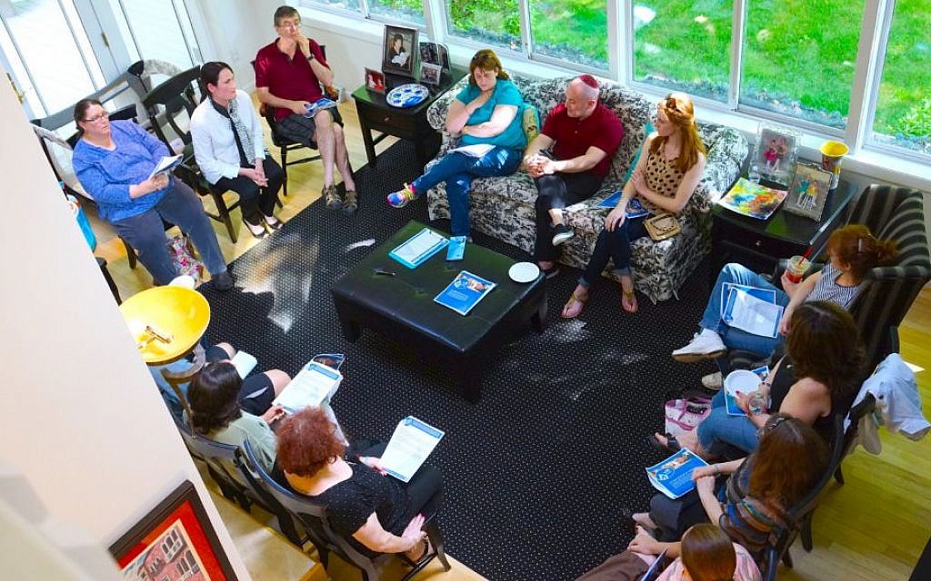 Parents and teachers of the closing Kehillah Schechter Academy meet in Easton, Mass., to discuss launching a new area day school on May 25, 2014. (Devorah Daniels/JTA)