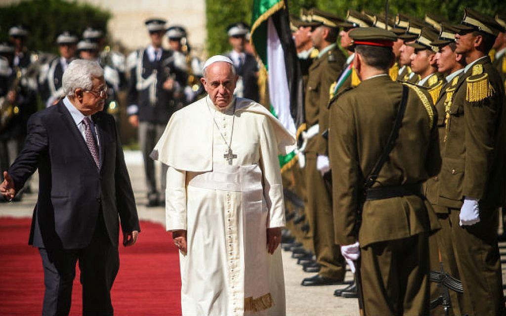 Pope Francis is welcomed by Palestinian President Mahmoud Abbas in the West Bank city of Bethlehem on May 25, 2014 (photo credit: Atta Jaber/Flash90)