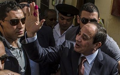 Egypt's ex-army chief Abdel Fattah el-Sisi after casting his vote at a polling station in the north Cairo district of Heliopolis on May 26, 2014. (Photo credit: Khaled Desouki/AFP)