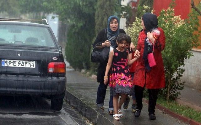 Iranians on the streets of Tehran, illustrative photo (Photo credit: Atta Kenare/AFP) Iranians on the streets of Tehran, illustrative photo (Photo credit: Atta Kenare/AFP)