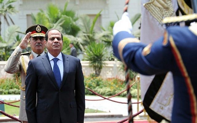 President-elect Abdel Fattah al-Sisi reviewing the honor guard during the handing over of power ceremony in Cairo, June 8, 2014. (photo credit: AFP/ Egyptian Presidency) President-elect Abdel Fattah al-Sisi reviewing the honor guard during the handing over of power ceremony in Cairo, June 8, 2014. (photo credit: AFP/ Egyptian Presidency)