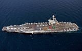 A handout picture released by the US Navy shows aircraft carrier USS George H.W. Bush (CVN 77) sailing in the Arabian Sea on June 13, 2014. (photo credit: AFP PHOTO / HO / US NAVY)