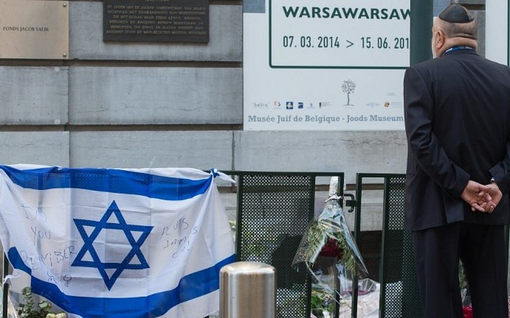 A man takes part in a solidarity ceremony of the World Jewish Congress after the killings at the Jewish museum in Brussels on June 2, 2014. photo credit: AFP/ BELGA / BENOIT DOPPAGNE) A man takes part in a solidarity ceremony of the World Jewish Congress after the killings at the Jewish museum in Brussels on June 2, 2014. photo credit: AFP/ BELGA / BENOIT DOPPAGNE)