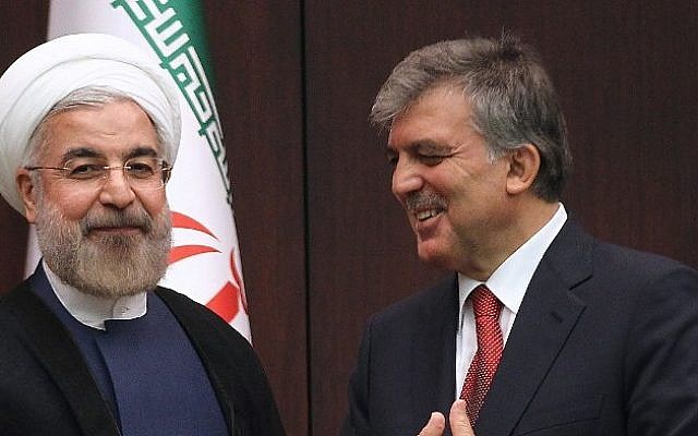 Turkish President Abdullah Gul (R) and Iranian President Hassan Rouhani speak during a press conference at the presidential palace in Ankara, on June 9, 2014. (photo credit: AFP PHOTO/ADEM ALTAN) Turkish President Abdullah Gul (R) and Iranian President Hassan Rouhani speak during a press conference at the presidential palace in Ankara, on June 9, 2014. (photo credit: AFP PHOTO/ADEM ALTAN)