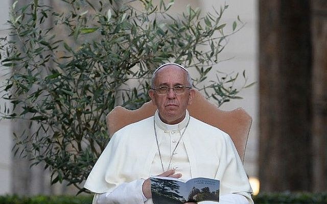 Pope Francis sits next to an olive tree during a joint peace prayer, June 8, 2014. (photo credit: AFP/FILIPPO MONTEFORTE) Pope Francis sits next to an olive tree during a joint peace prayer, June 8, 2014. (photo credit: AFP/FILIPPO MONTEFORTE)