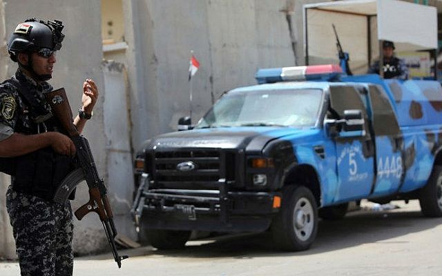 Iraqi policemen man a checkpoint in the capital Baghdad on June 12, 2014, as jihadists and anti-government fighters have spearheaded a major offensive that overrun all of Nineveh province. (photo credit: AFP/ Ahmad Al-Rubaye) Iraqi policemen man a checkpoint in the capital Baghdad on June 12, 2014, as jihadists and anti-government fighters have spearheaded a major offensive that overrun all of Nineveh province. (photo credit: AFP/ Ahmad Al-Rubaye)