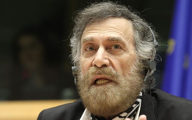 Syrian cartoonist Ali Farzat attends a discussion on the political situation in Syria, at the Committee on Human Rights at the European Parliament in Brussels, Wednesday, Oct. 10, 2012. (photo credit: AP/Yves Logghe) Syrian cartoonist Ali Farzat attends a discussion on the political situation in Syria, at the Committee on Human Rights at the European Parliament in Brussels, Wednesday, Oct. 10, 2012. (photo credit: AP/Yves Logghe)